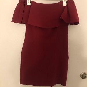 Maroon form fitting strapless dress